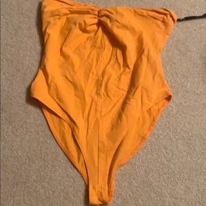 Orange strapless bodysuit